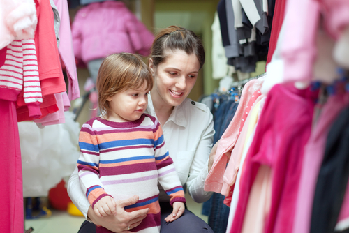 mum and child choosing clothes